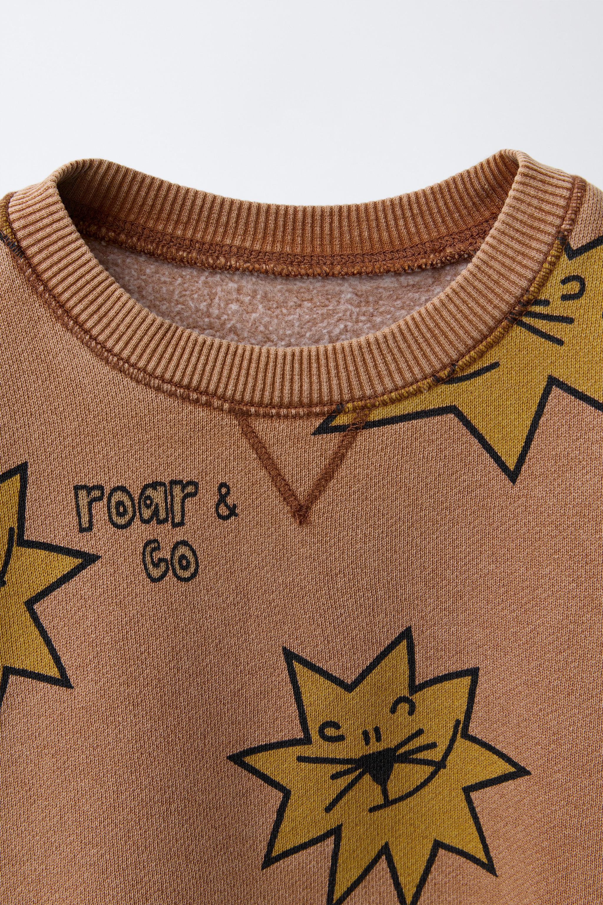 STAR PRINT SWEATSHIRT